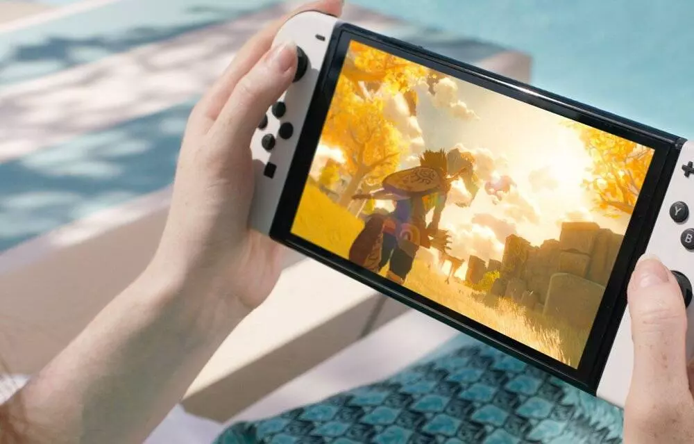 Игровая консоль Nintendo Switch OLED 64GB Splatoon - фото 2 Игровая консоль Nintendo Switch OLED 64GB Splatoon - фото 2